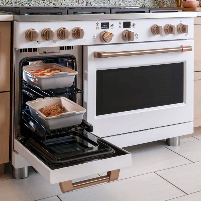 Large white stove with open oven door